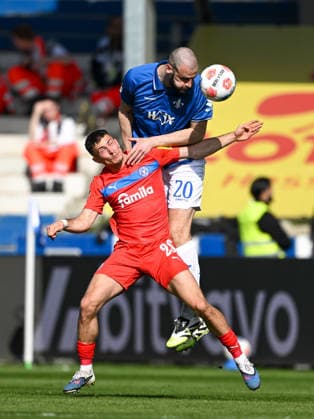 Adrian Kapralik Holstein Kiel, 20 in duel with Aleksandar Vukotic SV Darmstadt 1898, 20 , GER, SV Darmstadt 98 vs Holstein Kiel, Soccer 2 Bundesliga, Matchday 25, Season 2025 2026, 07 03 2026 DFL regulations prohibit any use of photographs as image sequences and or quasi video GER, SV Darmstadt 98 vs Holstein Kiel, Soccer 2 Bundesliga, Matchday 25, Season 2025 2026 Darmstadt Copyright: xEibner-Pressefoto FlorianxWiegandx EP_FWD