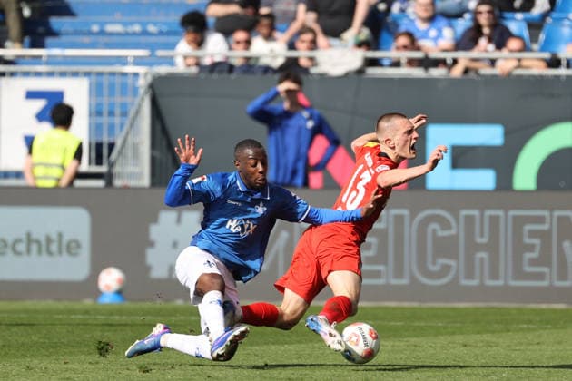 07 03 2026, xtvx, Fußball 2 Bundesliga, SV Darmstadt 98 Holstein Kiel v l Zweikampf, Duell, duel, tackle, compete Merveille Papela SV Darmstadt 98 Ivan Nekic Holstein Kiel DFL DFB REGULATIONS PROHIBIT ANY USE OF PHOTOGRAPHS as IMAGE SEQUENCES and or QUASI VIDEO Darmstadt