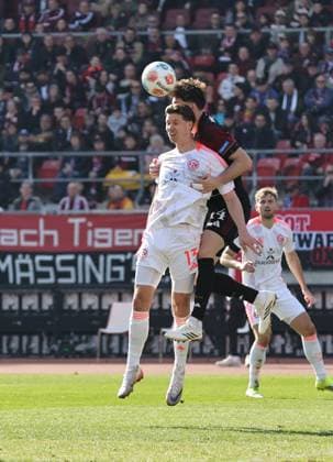 07 03 2026 Soccer Season 2025 2026 2 Soccer Bundesliga 25 Matchday 1 FC Nürnberg FCN Club Fortuna Düsseldorf F95 Sportfoto Zink DaMa xdaxmax DFL regulations prohibit any use of photographs as image sequences and or quasi video only for editorial use Cedric Itten 13, Fortuna Düsseldorf F95 in header duel with Styopa Mkrtchyan 44, 1 FC Nürnberg FCN
