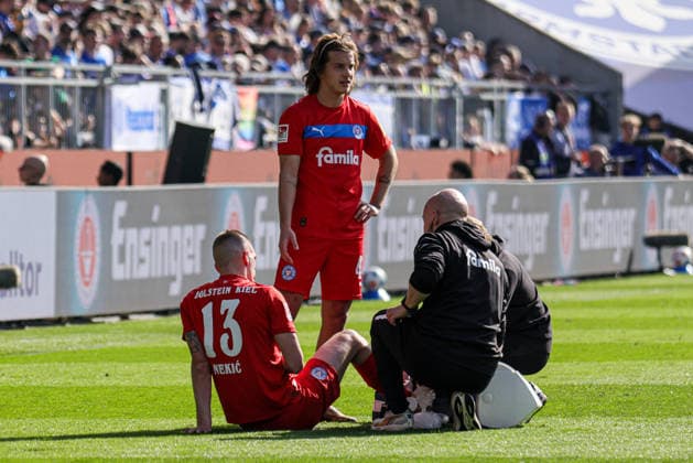 07 03 2026, xhettx, Soccer 2 Bundesliga, SV Darmstadt 98 Holstein Kiel v l Treatment of Ivan NekiÄ‡ KSV Holstein Kiel, 13 DFL DFB REGULATIONS PROHIBIT ANY USE OF PHOTOGRAPHS as IMAGE SEQUENCES and or QUASI VIDEO