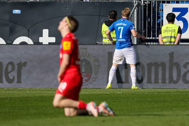 07 03 2026, xhettx, Soccer 2 Bundesliga, SV Darmstadt 98 Holstein Kiel v l Disappointment at Adrian Kapralik KSV Holstein Kiel, 20 and jubilation at the scorer of the 1 0 goal Isac Alexi Sivert Lidberg SV Darmstadt 98, 7 DFL DFB REGULATIONS PROHIBIT ANY USE OF PHOTOGRAPHS as IMAGE SEQUENCES and or QUASI VIDEO