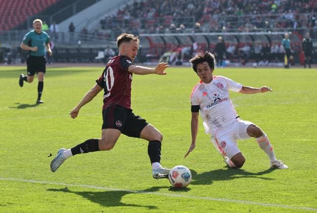 07 03 2026 Soccer Season 2025 2026 2 Soccer Bundesliga 25 Matchday 1 FC Nürnberg FCN Club Fortuna Düsseldorf F95 Sportfoto Zink DaMa xdaxmax DFL regulations prohibit any use of photographs as image sequences and or quasi video only for editorial use Julian Justvan 10, 1 FC Nürnberg FCN Satoshi Tanaka 16, Fortuna Düsseldorf F95
