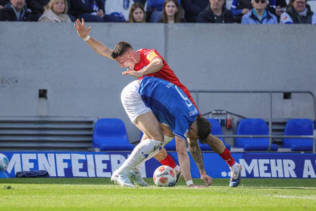 07 03 2026, xhettx, Soccer 2 Bundesliga, SV Darmstadt 98 Holstein Kiel v l Matej Maglica SV Darmstadt 98, 5 defends the ball in front of 20 DFL DFB REGULATIONS PROHIBIT ANY USE OF PHOTOGRAPHS as IMAGE SEQUENCES and or QUASI VIDEO