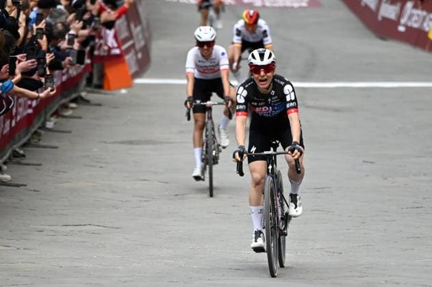 Swiss Elise Chabbey of FDJ SUEZ celebrates as she crosses the finish line to win the women elite Strade Bianche one day cycling race, 133km from and to Siena, Italy, on Saturday 07 March 2026. ELIASxROM  x166738872x