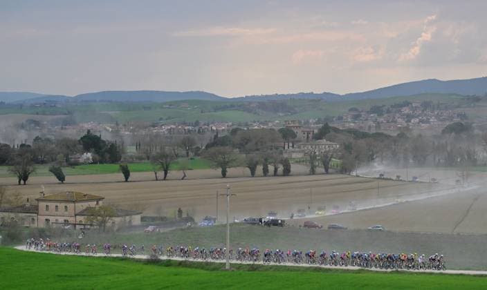 The pack of riders pictured in action during the men elite Strade Bianche one day cycling race, 203km from and to Siena, Italy on Saturday 07 March 2026. DIRKxWAEM  x166739984x