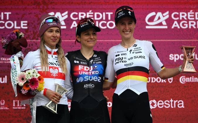 Polish Katarzyna Niewiadoma-Phinney of CANYON SRAM Zondacrypto, Swiss Elise Chabbey of FDJ celebrate onSUEZ and German Franziska Koch of FDJ United SUEZ celebrate on the podium of the women elite Strade Bianche one day cycling race, 133km from and to Siena, Italy, on Saturday 07 March 2026. ELIASxROM  x166740675x