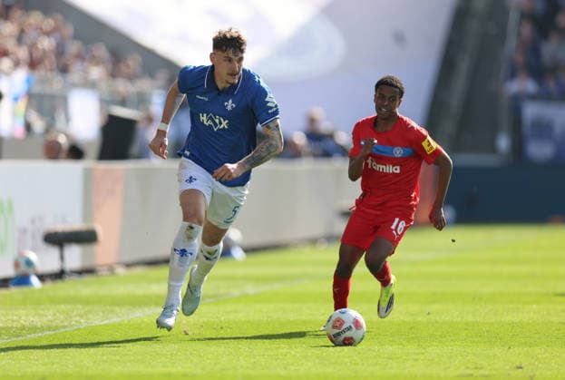 07 03 2026, Soccer 2 Bundesliga, SV Darmstadt 98 Holstein Kiel, emonline, emspor, despor, v l , Matej Maglica SV Darmstadt 98 , Andu Yobel Kelati Holstein Kiel DFL DFB REGULATIONS PROHIBIT ANY USE OF PHOTOGRAPHS AS IMAGE SEQUENCES AND OR QUASI VIDEO xdcx Copyright: HMBxMedia Claus