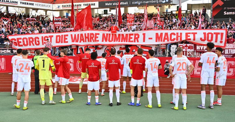 07 03 2026 Soccer Season 2025 2026 2 Soccer Bundesliga 25 Matchday 1 FC Nürnberg FCN Club Fortuna Düsseldorf F95 Sportfoto Zink xwoxzix DFL regulations prohibit any use of photographs as image sequences and or quasi video only for editorial use Mannschaft Team Fortuna vor Fans Fanblock nach Spielende Spruchband GEORG IST DIE WAHRE NUMMER 1 MACH ET JOT Georg Koch