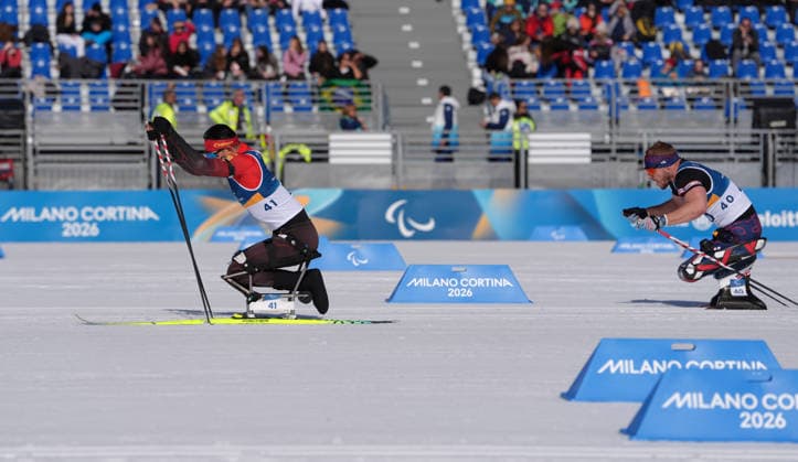 (260307) -- TESERO, March 7, 2026 -- Wang Tao (L) of China and Scott Meenagh of Britain compete during the men s sprint sitting final of para biathon at the Milan-Cortina 2026 Paralympic Winter games, Winterspiele,Spiele, Summer games in Tesero, Italy, March 7, 2026. ) (SP)ITALY-TESERO-PARALYMPIC WINTER GAMES-PARA BIATHLON-MEN S SPRINT SITTING CaixYang 