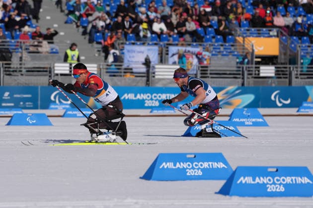 (260307) -- TESERO, March 7, 2026 -- Wang Tao (L) of China and Scott Meenagh of Britain compete during the men s sprint sitting final of para biathon at the Milan-Cortina 2026 Paralympic Winter games, Winterspiele,Spiele, Summer games in Tesero, Italy, March 7, 2026. ) (SP)ITALY-TESERO-PARALYMPIC WINTER GAMES-PARA BIATHLON-MEN S SPRINT SITTING CaixYang 