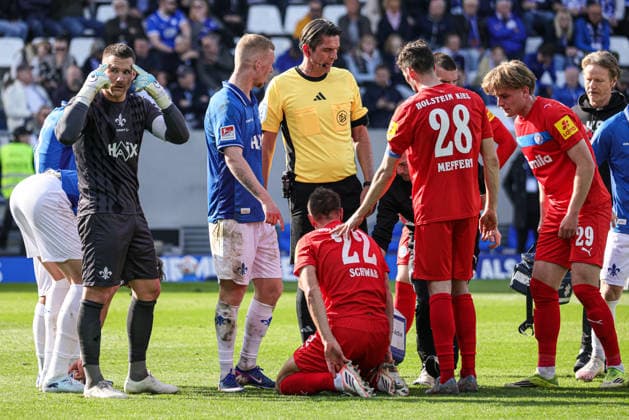 07 03 2026, xhettx, Soccer 2 Bundesliga, SV Darmstadt 98 Holstein Kiel v l treatment at Stefan Schwab KSV Holstein Kiel, 22 DFL DFB REGULATIONS PROHIBIT ANY USE OF PHOTOGRAPHS as IMAGE SEQUENCES and or QUASI VIDEO