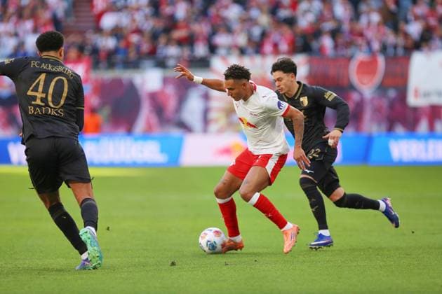 Leipzig, Saxony, Germany, 07 03 2026 Red Bull Arena 25 Matchday, Season 2025 26, 1 Soccer Bundesliga RB Leipzig FC Augsburg Noahkai Banks 40, FCA , Antonio Nusa 7, RBL and Fabian Rieder 32, FCA Copyright: xdtsxNachrichtenagenturx dts_109918