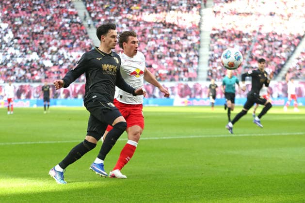 1 Soccer Bundesliga RB Leipzig FC Augsburg 07 03 2026 Fabian Rieder 32, FC Augsburg vs Willi Orban 4, RB Leipzig LEIPZIG, GERMANY MARCH 7 Bundesliga match RB Leipzig FC Augsburg at Red Bull Arena on matchday 25 of Bundesliga 1 on March 7, 2026 in Leipzig, Germany DFL REGULATIONS PROHIBIT ANY USE OF PHOTOGRAPHS AS IMAGE SEQUENCES AND OR QUASI VIDEO Copyright: xBEAUTIFULxSPORTS JanxKaeferx