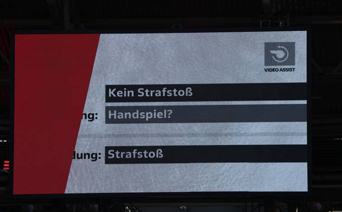 VAR Video Assist Referee Handball Penalty Sport Football Soccer DFL Bundesliga Men 25 Matchday Season 2025 2026 07 03 2026 RasenBallsport RB Leipzig RBL vs FC Augsburg FCA at RedBull Arena DFL regulations prohibit any use of photographs as image sequences and or quasi video