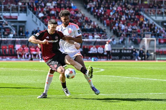2 Bundesliga 1 FC Nuremberg Fortuna Düsseldorf 07 03 2026 NUREMBERG, GERMANY 07 MARCH in the duel Elias EGOULI Fortuna Düsseldorf 44 and Luka LOCHOSHVILI 1 FC Nuernberg 24 during the match between 1 FC Nuremberg and Fortuna Düsseldorf on matchday 25 of Bundesliga 2 at Max Morlock Stadium DFL REGULATIONS PROHIBIT ANY USE OF PHOTOGRAPHS AS IMAGE SEQUENCES AND OR QUASI VIDEO Copyright: xBEAUTIFULxSPORTS Goldbergx