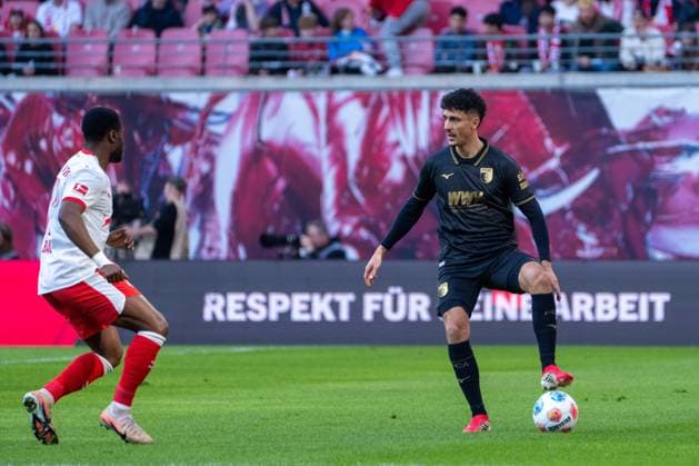Germany Bundesliga 2025 2026, Matchday 25 RB Leipzig vs FC Augsburg Red Bull Arena Leipzig Dimitrios Giannoulis FC Augsburg, 13 on the ball Copyright: xTomxLauruschkatx