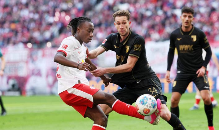 RB Leipzig Augsburg Bundesliga Leipzig, 07 03 2026, Red Bull Arena, Soccer, 1 Bundesliga, 25 Matchday , RB Leipzig vs FC Augsburg , Pictured from left Yan Diomande 49, RB Leipzig , Arthur Chaves 34, Augsburg , For editorial use only Only editorial use , DFL DFB regulations prohibit any use of photographs as image sequences and or quasi video ,