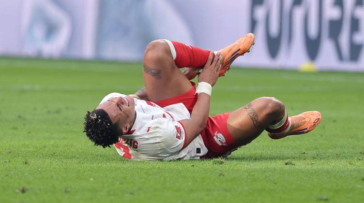 Antonio Nusa battered on the ground Single image Crop action Sport Soccer Football DFL Bundesliga Men 25 Matchday Season 2025 2026 07 03 2026 RasenBallsport RB Leipzig RBL vs FC Augsburg FCA at RedBull Arena DFL regulations prohibit any use of photographs as image sequences and or quasi video