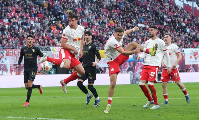 Willi Orban, Christoph Baumgartner, Romulo duel Match scene Action Sport Football Soccer DFL Bundesliga Men 25 Matchday Season 2025 2026 07 03 2026 RasenBallsport RB Leipzig RBL vs FC Augsburg FCA at RedBull Arena DFL regulations prohibit any use of photographs as image sequences and or quasi video