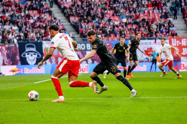 Antonio Nusa RB Leipzig, 07 on the ball, duel, duel, fight Robin Fellhauer FC Augsburg, 19 , RB Leipzig vs FC Augsburg, Football, 1 Bundesliga, 25 Matchday, Season 2025 2026, 07 03 2026,¨ DFL REGULATIONS PROHIBIT ANY USE OF PHOTOGRAPHS AS IMAGE SEQUENCES AND OR QUASI VIDEO,¨ RB Leipzig vs FC Augsburg, Football, 1 Bundesliga, 25 Matchday, Season 2025 2026, 07 03 2026 Leipzig Copyright: xEibner-Pressefoto LauraxRoemerx EP_LRR