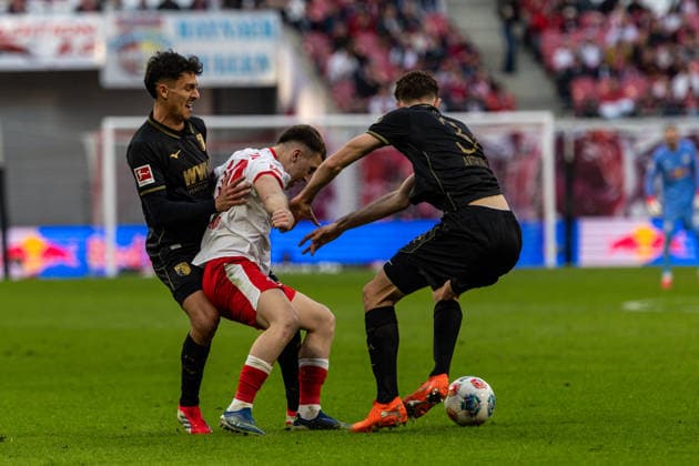 GER, Bundesliga, RB Leipzig FC Augsburg 07 03 2026, Red Bull Arena, Leipzig, GER, Bundesliga, RB Leipzig FC Augsburg Brajan Gruda RB Leipzig 10 in duel against Dimitris Giannoulis FC Augsburg 13 and Arthur Chaves FC Augsburg 34 Â nordphotoxGmbHxx xAlexanderxTrienitz nph00051