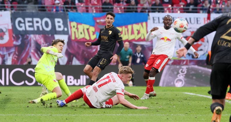RB Leipzig Augsburg Bundesliga Leipzig, 07 03 2026, Red Bull Arena, Soccer, 1 Bundesliga, 25 Matchday , RB Leipzig vs FC Augsburg , In the picture Goal chance for RB Leipzig goalkeeper Finn Dahmen 1,Augsburg parries against Conrad Harder 11, RBL , For editorial use only Only editorial use , DFL DFB regulations prohibit any use of photographs as image sequences and or quasi video ,