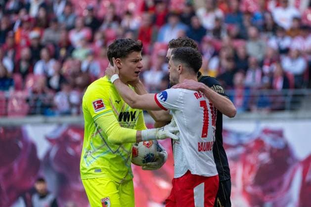 Germany Bundesliga 2025 2026, Matchday 25 RB Leipzig vs FC Augsburg Red Bull Arena Leipzig Finn Dahmen FC Augsburg, 1 Christoph Baumgartner RB Leipzig, 14 Copyright: xTomxLauruschkatx