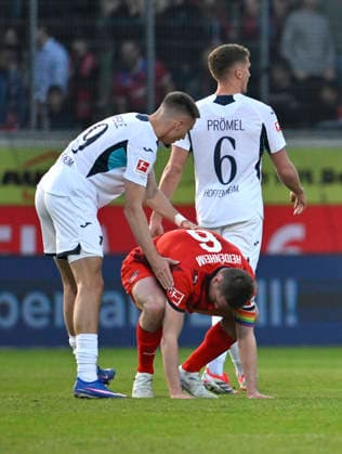 nach Spielende: Patrick Mainka 1. FC Heidenheim 1846 FCH (06) enttaeuscht Grischa Proemel TSG 1899 Hoffenheim (06) Tim Lemperle TSG 1899 Hoffenheim (19) spendet Trost 1. FC Heidenheim 1846 FCH vs TSG 1899 Hoffenheim 07.03.2026 DFL REGULATIONS PROHIBIT ANY USE OF PHOTOGRAPHS AS IMAGE SEQUENCES AND OR QUASI-VIDEO 1. FC Heidenheim 1846 FCH vs TSG 1899 Hoffenheim *** after the end of the match Patrick Mainka 1 FC Heidenheim 1846 FCH 06 disappointed Grischa Proemel TSG 1899 Hoffenheim 06 Tim Lemperle TSG 1899 Hoffenheim 19 gives consolation 1 FC Heidenheim 1846 FCH vs TSG 1899 Hoffenheim 07 03 2026 DFL REGULATIONS PROHIBIT ANY USE OF PHOTOGRAPHS AS IMAGE SEQUENCES AND OR QUASI VIDEO 1 FC Heidenheim 1846 FCH vs TSG 1899 Hoffenheim