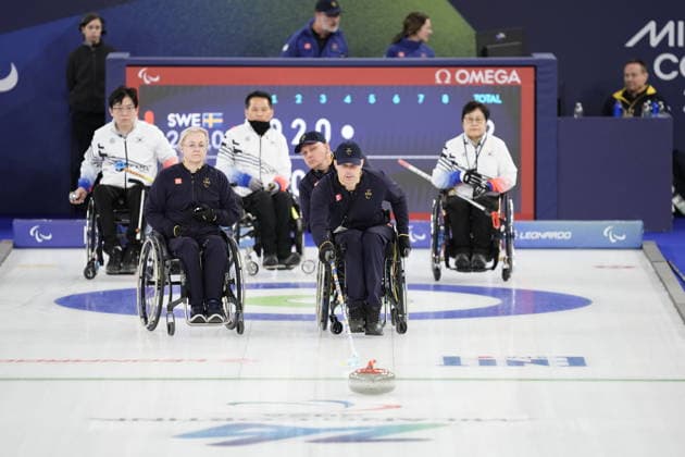 CORTINA, ITALY 20260307 Sweden s Sabina Johansson, Kristina Ulander and Marcus Holm during Saturday s mixed curling match between Sweden and South Korea in the Paralympics at Cortina Curling Olympic Stadium. *** The image is included in the SPORTS PACKAGE. For others PAYMENT IMAGE *** CORTINA ITALY x9200x *** CORTINA, ITALY 20260307 Sweden s Sabina Johansson, Kristina Ulander and Marcus Holm during Saturday s mixed curling match between Sweden and South Korea in the Paralympics at Cortina Curling Olympic Stadium The image is included in the SPORTS PACKAGE For others PAYMENT IMAGE CORTINA ITALY x9200x  Copyright: xBjörnxLarssonxRosvall TTx PARALYMPICS 2026 CURLING