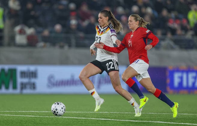 NOR, Stavanger, Norway vs Germany, international match, football, FIFA, 2026 2027 season, World Cup qualifiers, Viking Stadion, matchday 2 in the picture from l Jule Brand Germany Women 22 , Lisa Naalsund Norway Women 21 , on the way to the goal for 4 0 DFB DFL REGULATIONS PROHIBIT ANY USE OF PHOTOGRAPHS AS IMAGE SEQUENCES AND OR QUASI VIDEO, 07 03 2026 Copyright: HMBxMedia HendrikxHamelau