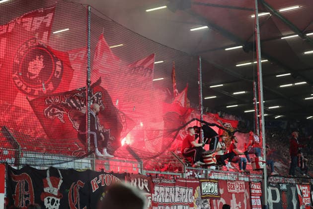 07 03 2026, xrekx, Soccer 2 Bundesliga, VfL Bochum 1 FC Kaiserslautern v l FCK Fans ,atmosphere, scarves, jersey, flag, banner, Ultras, spectators, visitors, choreo, choreography, atmosphere, spectators, Visitors pyrotechnics, pyro torch, Bengalo, Bengal fire, fan culture, Ultras, stadium pyrotechnics, choreography with pyro, fan block, DFL DFB REGULATIONS PROHIBIT ANY USE OF PHOTOGRAPHS as IMAGE SEQUENCES and or QUASI VIDEO Bochum