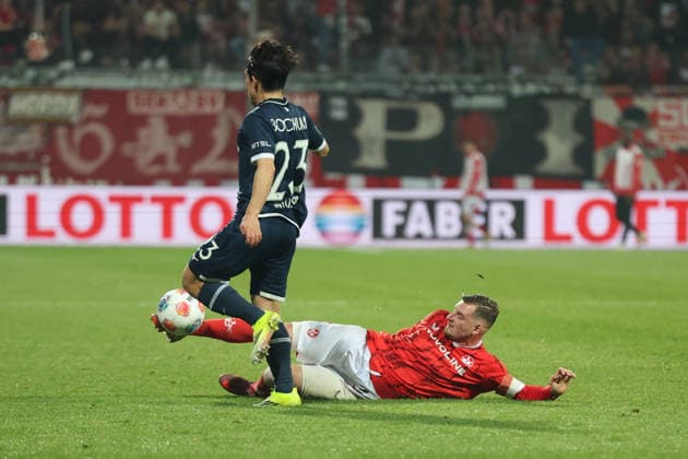 07 03 2026, xrekx, Fußball 2 Bundesliga, VfL Bochum 1 FC Kaiserslautern v l Koji Miyoshi VfL Bochum Marlon Ritter 1 FC Kaiserslautern Zweikampf, Aktion, action, battle for the ball DFL DFB REGULATIONS PROHIBIT ANY USE OF PHOTOGRAPHS as IMAGE SEQUENCES and or QUASI VIDEO Bochum