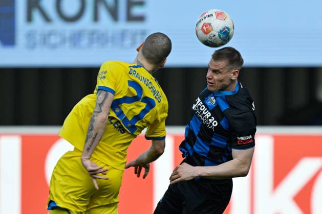 Paderborn, Home Deluxe Arena, 07 03 26, GER, Herren, 2 Bundesliga, Saison 2025 2026, SC Paderborn 07 Eintracht Braunschweig Bild v li im Zweikampf Kevin EHLERS Braunschweig und Steffen TIGGES Paderborn DFL regulations prohibit any use of photographs as image sequences and or quasi video NRW Deutschland