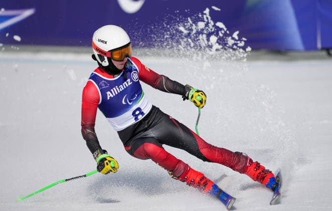 (260308) -- CORTINA D AMPEZZO, March 8, 2026 -- Wang Xingdong of China competes during the para alpine skiing men s downhill vision impaired match at the Milan-Cortina 2026 Paralympic Winter games, Winterspiele,Spiele, Summer games in Cortina D ampezzo, Italy, March 7, 2026. ) (SP)ITALY-CORTINA D AMPEZZO-PARALYMPIC WINTER GAMES-PARA ALPINE SKIING-MEN S DOWNHILL-VISION IMPAIRED WangxKaiyan 