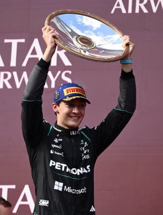 2026 AUSTRALIAN F1 GRAND PRIX, Mercedes driver George Russell celebrates on the podium after winning the 2026 Australian Grand Prix at Albert Park Circuit in Melbourne, Sunday, March 8, 2026. ( NO ARCHIVING, EDITORIAL USE ONLY MELBOURNE VICTORIA AUSTRALIA  Copyright: xJOELxCARRETTx 20260308144578965683