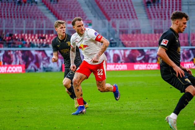 David Raum RB Leipzig, 22 , Anton Kade FC Augsburg, 30 , RB Leipzig vs FC Augsburg, Football, 1 Bundesliga, 25 Matchday, Season 2025 2026, 07 03 2026,¨ DFL REGULATIONS PROHIBIT ANY USE OF PHOTOGRAPHS AS IMAGE SEQUENCES AND OR QUASI VIDEO,¨ RB Leipzig vs FC Augsburg, Football, 1 Bundesliga, 25 Matchday, Season 2025 2026, 07 03 2026 Leipzig Copyright: xEibner-Pressefoto LauraxRoemerx EP_LRR