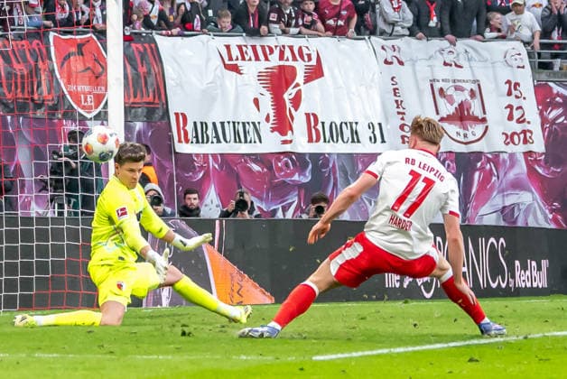 Leipzig, Germany 07 March 2026 1 Bundesliga 2025 2026 RB Leipzig vs FC Augsburg In the picture from left in duel goalkeeper Finn Dahmen FCA and Conrad Harder RB DFL regulations prohibit any use of photographs as image sequences and or quasi video Copyright: xFotostandx xNachtigallx