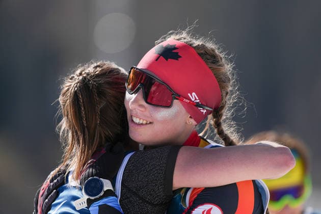 (260308) -- TESERO, March 8, 2026 -- Natalie Wilkie (R) of Canada celebrates after winning silver alongside sixth placed Brittany Hudak of Canada after the para biathlon women s sprint standing at the Milan-Cortina 2026 Paralympic Winter games, Winterspiele,Spiele, Summer games in Tesero, Italy, March 7, 2026. ) (SP)ITALY-TESERO-PARALYMPIC WINTER GAMES-PARA BIATHLON-WOMEN S SPRINT STANDING HouxZhaokang 