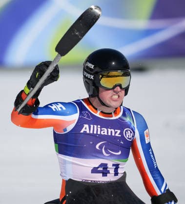(260308) -- CORTINA D AMPEZZO, March 8, 2026 -- Niels de Langen of the Netherlands reacts during the para alpine skiing men s downhill sitting match at the Milan-Cortina 2026 Paralympic Winter games, Winterspiele,Spiele, Summer games in Cortina D ampezzo, Italy, March 7, 2026. ) (SP)ITALY-CORTINA D AMPEZZO-PARALYMPIC WINTER GAMES-PARA ALPINE SKIING-MEN S DOWNHILL-SITTING WangxKaiyan 