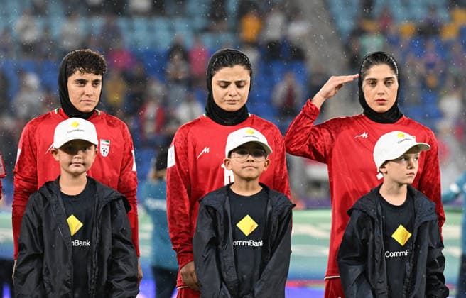 SOCCER ASIAN CUP IRAN PHILIPPINES, Iran players are seen during their national anthem during the national anthem during the AFC Women™s Asian Cup Group A match between Iran and Philippines at Gold Coast Stadium on the Gold Coast, Sunday, March 8, 2026. ( NO ARCHIVING, EDITORIAL USE ONLY GOLD COAST QUEENSLAND AUSTRALIA  Copyright: xDAVExHUNTx 20260308156581648771