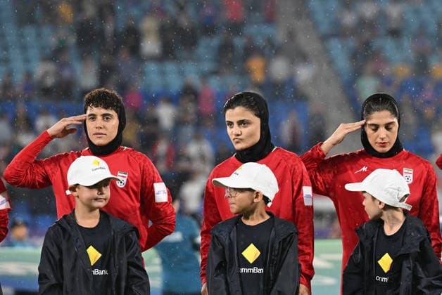SOCCER ASIAN CUP IRAN PHILIPPINES, Iran players are seen during their national anthem during the national anthem during the AFC Women™s Asian Cup Group A match between Iran and Philippines at Gold Coast Stadium on the Gold Coast, Sunday, March 8, 2026. ( NO ARCHIVING, EDITORIAL USE ONLY GOLD COAST QUEENSLAND AUSTRALIA  Copyright: xDAVExHUNTx 20260308127427789064