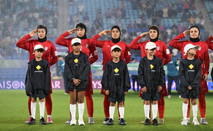SOCCER ASIAN CUP IRAN PHILIPPINES, Iran players are seen during their national anthem during the national anthem during the AFC Women™s Asian Cup Group A match between Iran and Philippines at Gold Coast Stadium on the Gold Coast, Sunday, March 8, 2026. ( NO ARCHIVING, EDITORIAL USE ONLY GOLD COAST QUEENSLAND AUSTRALIA  Copyright: xDAVExHUNTx 20260308184033597199