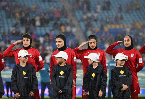 SOCCER ASIAN CUP IRAN PHILIPPINES, Iran players are seen during their national anthem during the national anthem during the AFC Women™s Asian Cup Group A match between Iran and Philippines at Gold Coast Stadium on the Gold Coast, Sunday, March 8, 2026. ( NO ARCHIVING, EDITORIAL USE ONLY GOLD COAST QUEENSLAND AUSTRALIA  Copyright: xDAVExHUNTx 20260308187147608635