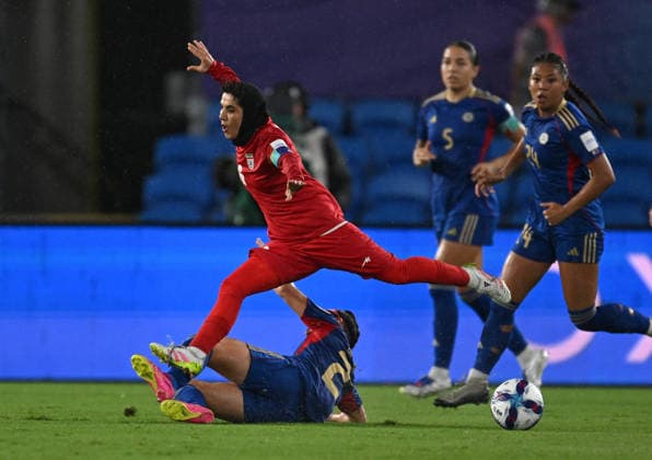 SOCCER ASIAN CUP IRAN PHILIPPINES, Zahra Sarbali of Islamic Republic of Iran collides with Malea Cesar of the Philippines during the AFC Women™s Asian Cup Group A match between Iran and Philippines at Gold Coast Stadium on the Gold Coast, Sunday, March 8, 2026. ( NO ARCHIVING, EDITORIAL USE ONLY GOLD COAST QUEENSLAND AUSTRALIA  Copyright: xDAVExHUNTx 20260308148360730865