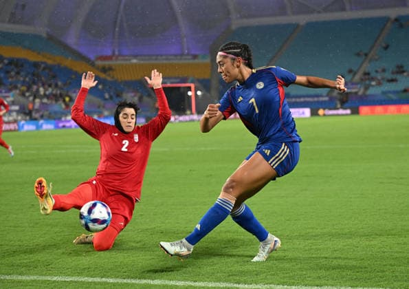 SOCCER ASIAN CUP IRAN PHILIPPINES, Atefeh Imani of Islamic Republic of Iran competes with Jael Guy of the Philippines during the AFC Women™s Asian Cup Group A match between Iran and Philippines at Gold Coast Stadium on the Gold Coast, Sunday, March 8, 2026. ( NO ARCHIVING, EDITORIAL USE ONLY GOLD COAST QUEENSLAND AUSTRALIA  Copyright: xDAVExHUNTx 20260308123204168651