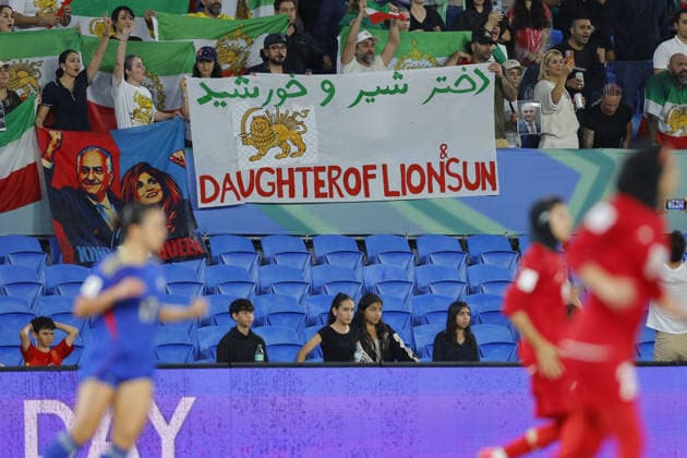 GOLD COAST, AUSTRALIA - MARCH 08 Supporters of Iran are seen holding signs of support for Iran women team during the Womens Asian Cup match between Islamic Republic of Iran and Philippines at the Gold Coast Stadium on March 08 2026 in Gold Coast, Australia Copyright: xMatthewxStarlingx xSPPx Sportspressphoto_SPR104847