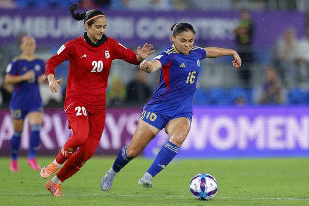 GOLD COAST, AUSTRALIA - MARCH 08 Sara Didar (20 IR Iran) battles for the ball with Sofia Harrison (16 Philippines) during the Womens Asian Cup match between Islamic Republic of Iran and Philippines at the Gold Coast Stadium on March 08 2026 in Gold Coast, Australia Copyright: xMatthewxStarlingx xSPPx Sportspressphoto_SPR104929