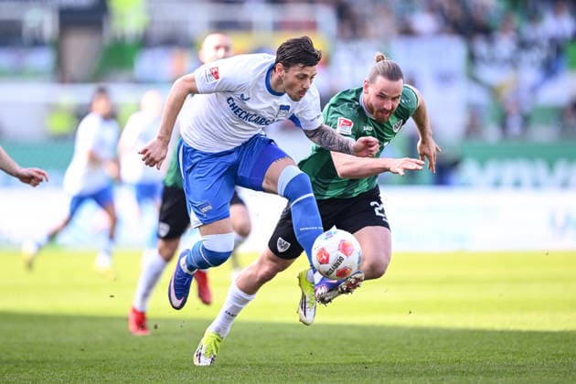 08 03 2026, Soccer, 2 Bundesliga, 25 Matchday Season 2025 2026, Preußen Münster Hertha BSC, Dawid Kownacki Hertha BSC , Jannis Heuer Preußen Münster xRHR PHOTO TKx Copyright: RHR-FOTOx RHR-FOTO TK