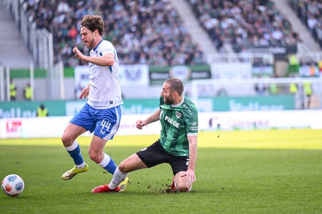 08 03 2026, Soccer, 2 Bundesliga, 25 Matchday Season 2025 2026, Preußen Münster Hertha BSC, Linus Gechter Hertha BSC , Rico Preißinger Preußen Münster xRHR PHOTO TKx Copyright: RHR-FOTOx RHR-FOTO TK