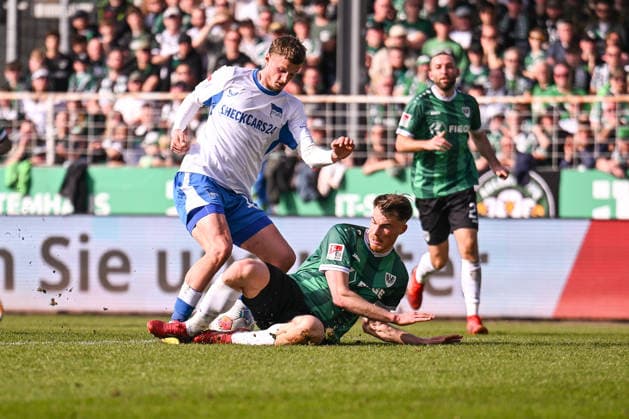 08 03 2026, Football, 2 Bundesliga, 25 Matchday Season 2025 2026, Preußen Münster Hertha BSC, Michaël Cuisance Hertha BSC is fouled by Niko Koulis Preußen Münster Afterwards there is a penalty xRHR PHOTO TKx Copyright: RHR-FOTOx RHR-FOTO TK